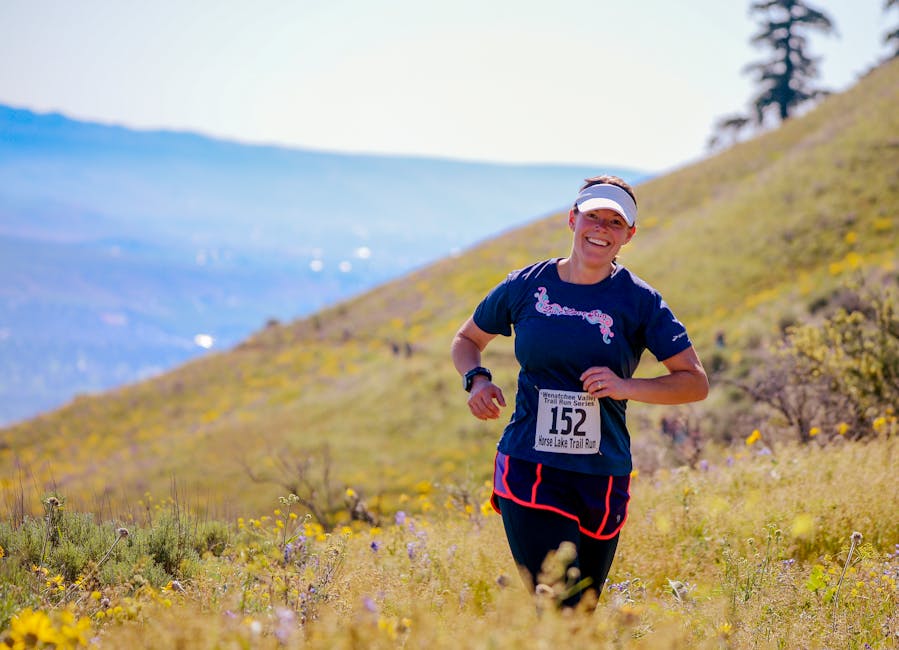 Chugach State Park Trail Race — June 26, 2026 — Woman enjoying a trail marathon in the vibrant hills of Wenatchee, Washington.